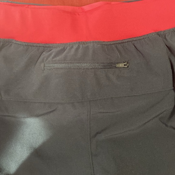 Women’s under armor running shorts with built in biker shorts - Picture 3 of 5